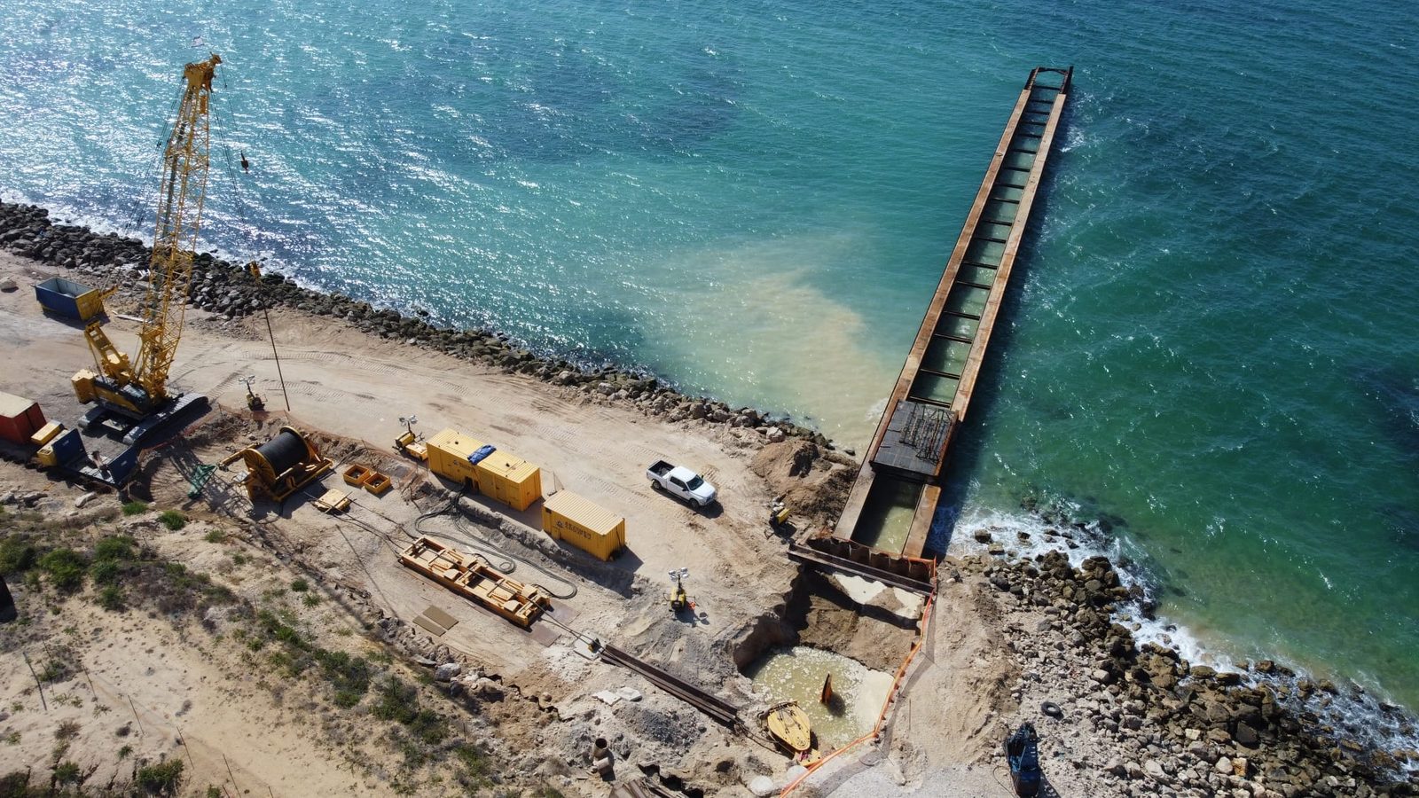 Landfall crossing structure extending to sea